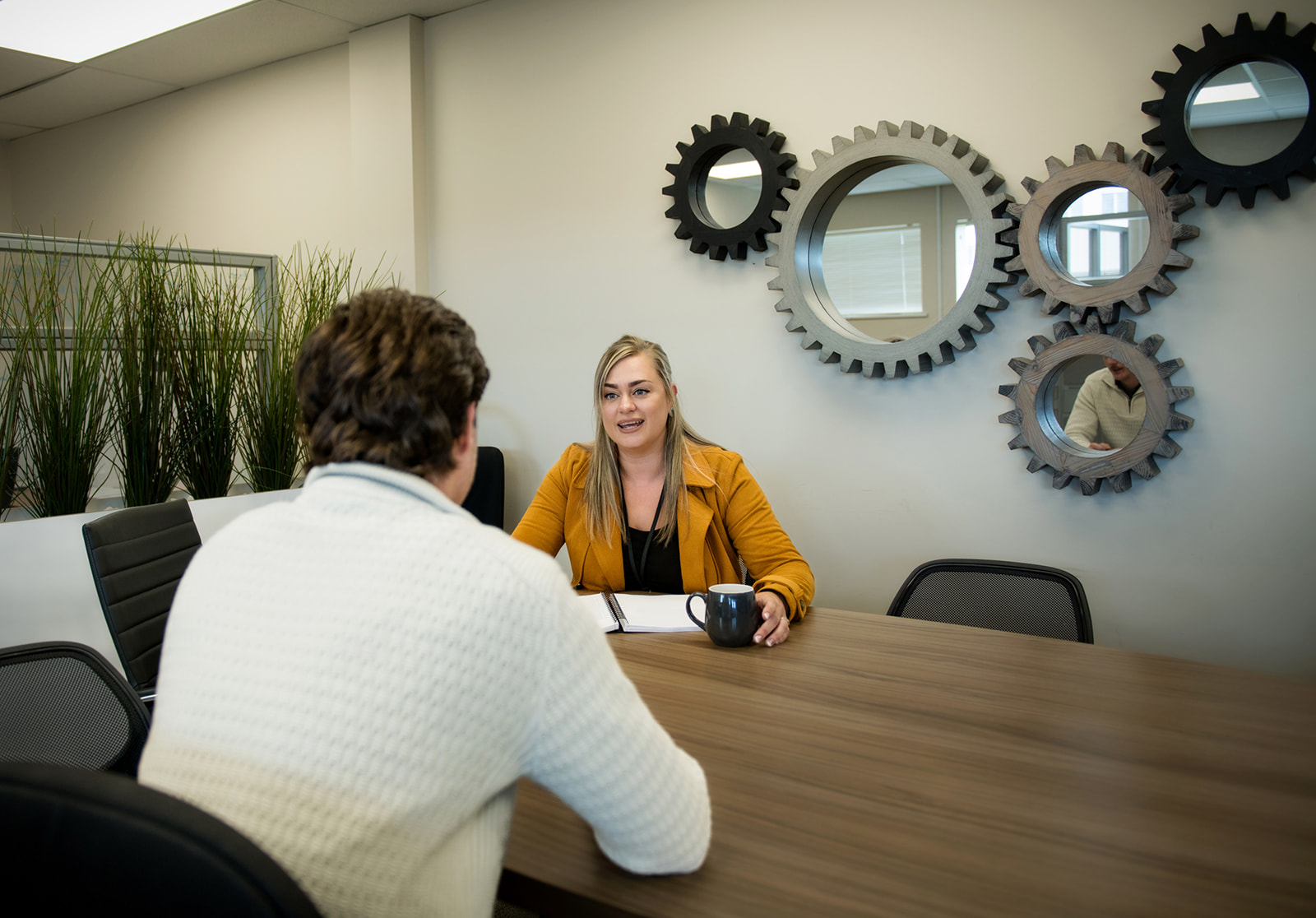 BECN staff chats with client