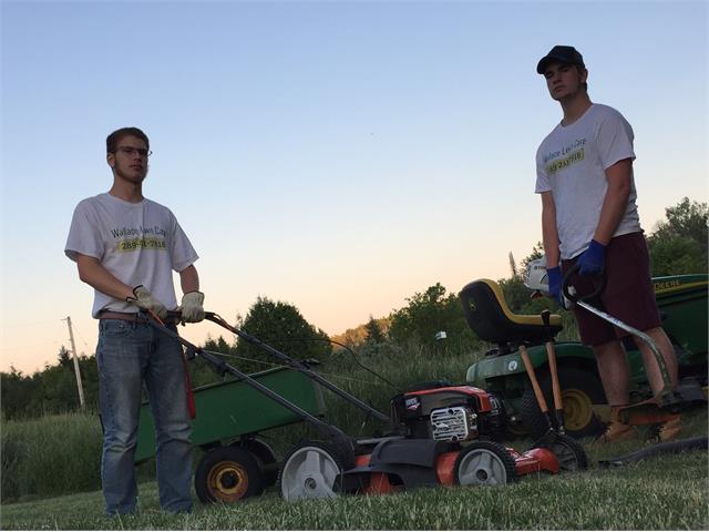 Summer Company business owners with lawnmowers